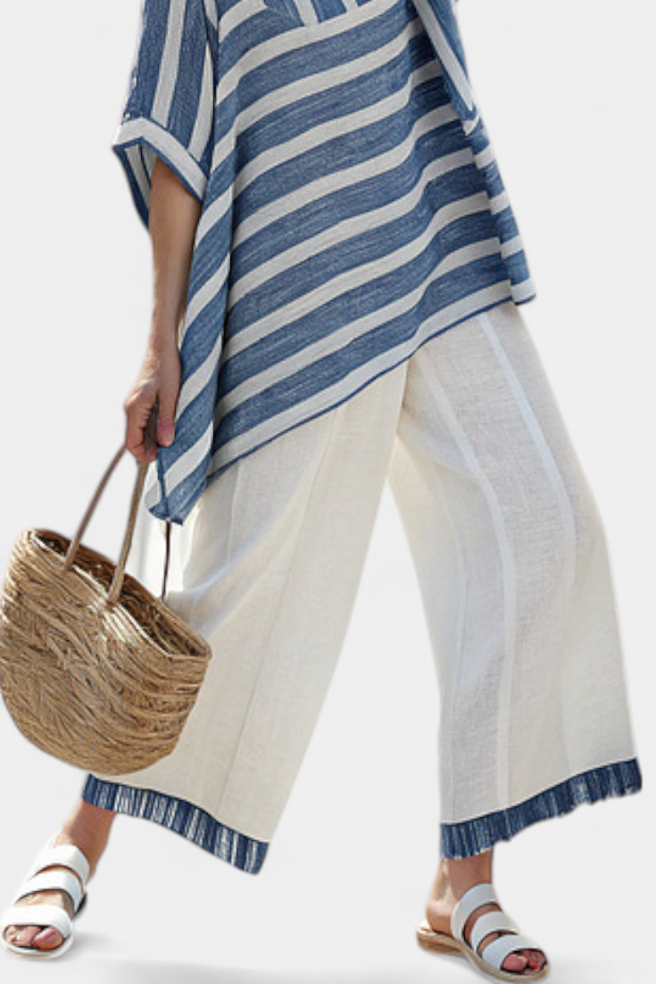 Ornella – sophisticated blue striped top and pants with details at the hem